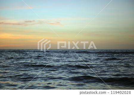 Dramatic red ocean waves at sunset with soft evening sea dark water Dramatic red ocean waves at sunset with soft evening sea dark water 119402028