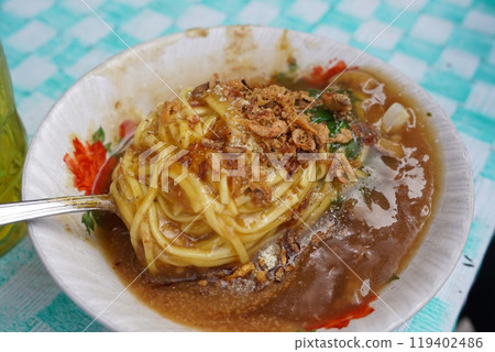 A bowl of Mie Ongklok, a popular Indonesian noodle dish. A bowl of Mie Ongklok, a popular Indonesian noodle dish. 119402486
