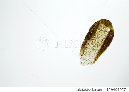 Smears of body scrub on white background. Fruit and berry body scrub texture of the swatch. Cosmetic smear 119403057