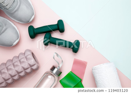 Healthy lifestyle, athlete's equipment set dumbbells, resistance band, foam roller for Myofascial release 119403120