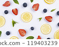 background of blueberries, strawberries, lemon slices and mint leaves on a white background - the concept of a healthy diet. Summer bright background, food design. High quality  119403239