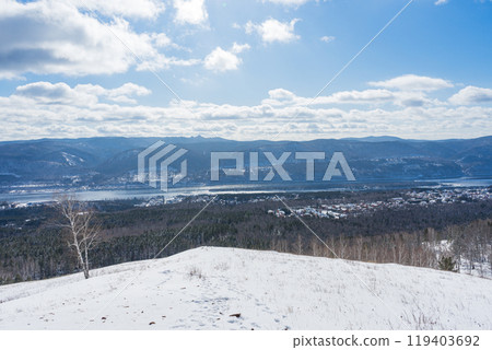 Unfrozen Yenisei river in Siberia, does not freeze in winter. Natural landscape Unfrozen Yenisei river in Siberia, does not freeze in winter. Natural landscape 119403692