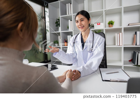 Doctor and Patient Consultation in Modern Clinic Setting with Medical Examination and Health Discussion 119403775