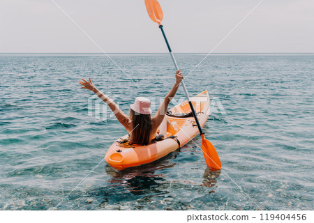 Kayaking Woman Ocean Enjoying Summer Vacation Kayaking Woman Ocean Enjoying Summer Vacation 119404456