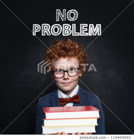 Smiling happy child boy portrait on black background 119404692