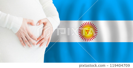 Demographics, pregnancy and love baby in Argentina concept. Pregnant woman making heart  119404709
