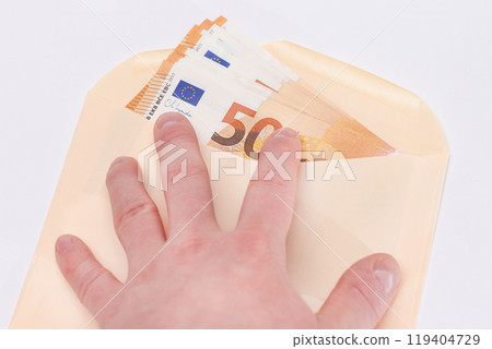 Hand Holds An Orange Paper Envelope with Stack of 50-Euro Banknotes Inside Hand Holds An Orange Paper Envelope with Stack of 50-Euro Banknotes Inside 119404729