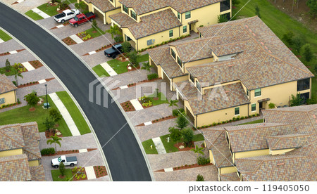 Aerial view of tightly located family houses in Florida closed suburban area. Real estate development in american suburbs 119405050