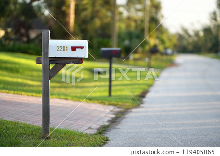 American mailbox at Florida home front yard on suburban street side American mailbox at Florida home front yard on suburban street side 119405065