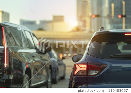 American street with driving cars at intersection with traffic lights in Miami, Florida. USA transportation American street with driving cars at intersection with traffic lights in Miami, Florida. USA transportation 119405067