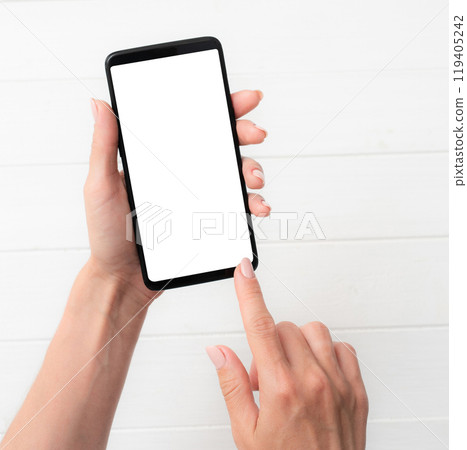 User holding smartphone with white screen 119405242