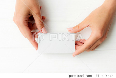 White business card in girl hands 119405248