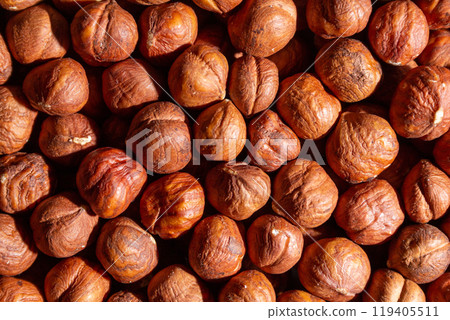 Scattered Peeled Hazelnut. Background from Hazelnuts 119405511