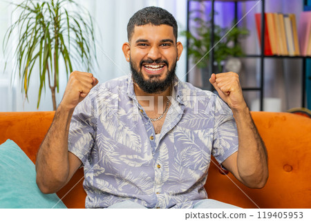 Excited happy young man surprised, shocked by sudden victory good win news celebrating wow reaction Excited happy young man surprised, shocked by sudden victory good win news celebrating wow reaction 119405953