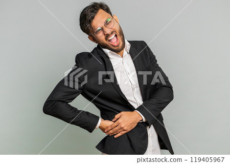 Man touching injured sore back, backache, suffering lower lumbar discomfort, muscle pain of overwork Man touching injured sore back, backache, suffering lower lumbar discomfort, muscle pain of overwork 119405967