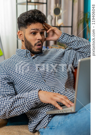 Frustrated business man having software problems with laptop error or mistake virus notification Frustrated business man having software problems with laptop error or mistake virus notification 119406048