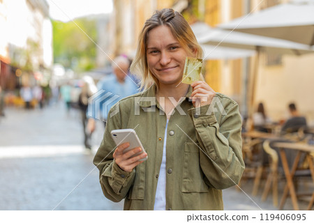 Woman using credit bank card and smartphone while transferring money, purchases online shopping Woman using credit bank card and smartphone while transferring money, purchases online shopping 119406095