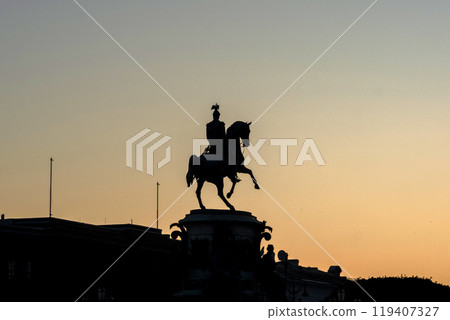 silhouette of the monument to Nicholas I against the light sky on a white night in St. Petersburg silhouette of the monument to Nicholas I against the light sky on a white night in St. Petersburg 119407327