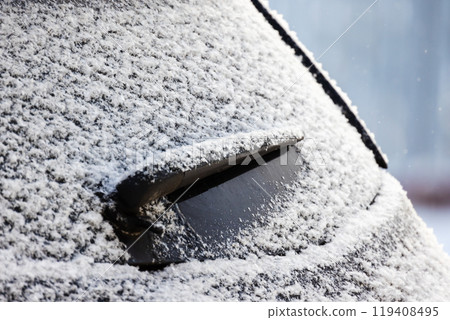 Close-up photo of a car wiper on rear window of modern SUV car Close-up photo of a car wiper on rear window of modern SUV car 119408495