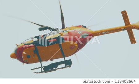 Flying helicopter of Securite Civile or a civil defense agency, France Flying helicopter of Securite Civile or a civil defense agency, France 119408664