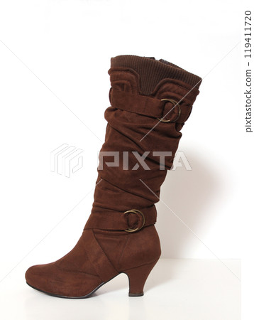 Brown Knee High Winter Fashion Boot on White Background Brown Knee High Winter Fashion Boot on White Background 119411720