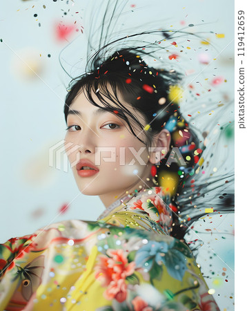 一張閃閃發光的笑臉，閃閃發光的五彩紙屑和一位亞洲女人 119412659