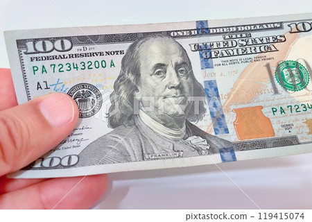 A Fan of $100 Bills.A close-up photo of a fan of $100 US dollar bills. The bills are arranged neatly, with the portrait of Benjamin Franklin visible on each bill. A Fan of $100 Bills.A close-up photo of a fan of $100 US dollar bills. The bills are arranged neatly, with the portrait of Benjamin Franklin visible on each bill. 119415074