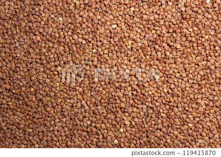 Dry Uncooked Brown Buckwheat Groats Background Dry Uncooked Brown Buckwheat Groats Background 119415870