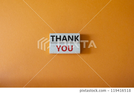 Thank you symbol. Wooden blocks with words Thank you. Beautiful orange background. Business and Thank you concept. Copy space. 119416518