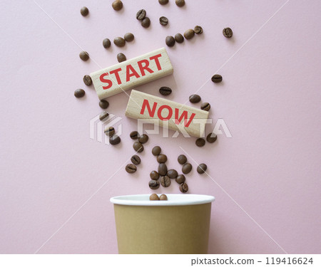 Start here symbol. Wooden blocks with words Start here Beautiful pink background with coffee cup and coffee beans. Business and Start here concept. Copy space. 119416624