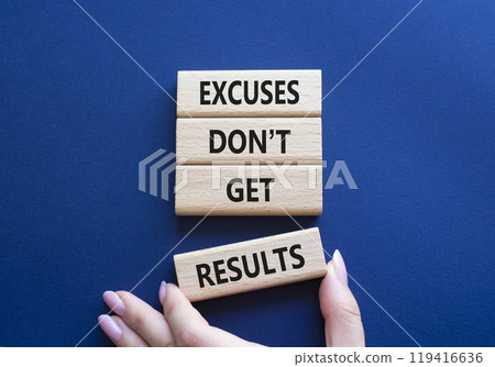 Results symbol. Concept words Excuses do not get results on wooden blocks. Businessman hand. Beautiful deep blue background. Business and Excuses do not get results concept. Copy space 119416636