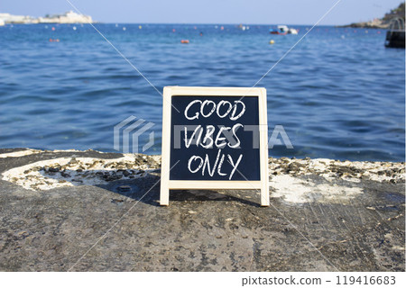 Good Vibes only symbol. Blackboard with Concept words Good Vibes only. Beautiful sea background. Business and Good Vibes only concept. Copy space. Good Vibes only symbol. Blackboard with Concept words Good Vibes only. Beautiful sea background. Business and Good Vibes only concept. Copy space. 119416683