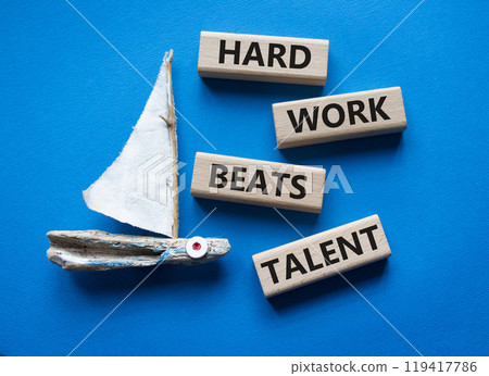 Talent symbol. Concept words Hard work beats talent on wooden blocks. Beautiful blue background with boat. Business and Hard work beats talent concept. Copy space Talent symbol. Concept words Hard work beats talent on wooden blocks. Beautiful blue background with boat. Business and Hard work beats talent concept. Copy space 119417786
