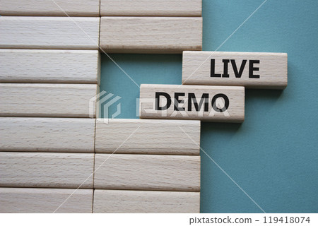 Live Demo symbol. Concept word Live Demo on wooden blocks. Beautiful grey green background. Business and Live Demo concept. Copy space Live Demo symbol. Concept word Live Demo on wooden blocks. Beautiful grey green background. Business and Live Demo concept. Copy space 119418074