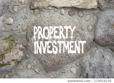 Property Investment symbol. Concept words Property Investment on stone wall. Beautiful stone background. Business and Property Investment concept. Copy space. Property Investment symbol. Concept words Property Investment on stone wall. Beautiful stone background. Business and Property Investment concept. Copy space. 119418238