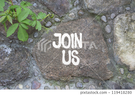 Join us symbol. Concept word Join us on stone wall. Beautiful stone background. Business and Join us concept. Copy space Join us symbol. Concept word Join us on stone wall. Beautiful stone background. Business and Join us concept. Copy space 119418280