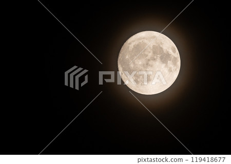 Moon shining in the night sky 119418677