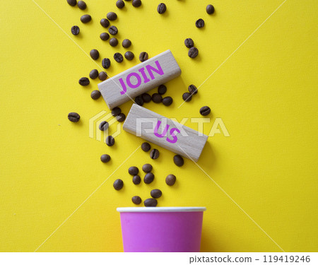 Join us symbol. Concept word Join us on wooden blocks. Beautiful yellow background with coffee cup. Business and Join us concept. Copy space 119419246
