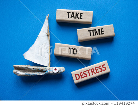 Take time to Destress symbol. Wooden blocks with words Take time to Destress. Beautiful blue background with boat. Business and Take time to Destress concept. Copy space. Take time to Destress symbol. Wooden blocks with words Take time to Destress. Beautiful blue background with boat. Business and Take time to Destress concept. Copy space. 119419274