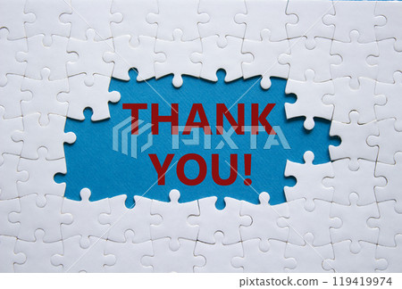 Thank you symbol. White puzzle with words Thank you. Beautiful blue background. Business and Thank you concept. Copy space. Thank you symbol. White puzzle with words Thank you. Beautiful blue background. Business and Thank you concept. Copy space. 119419974
