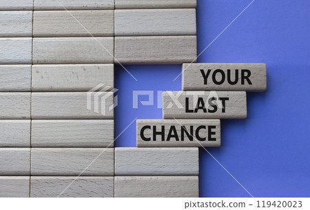 Your last Chance symbol. Concept words Your last Chance on wooden blocks. Beautiful purple background. Business and Your last Chance concept. Copy space. 119420023