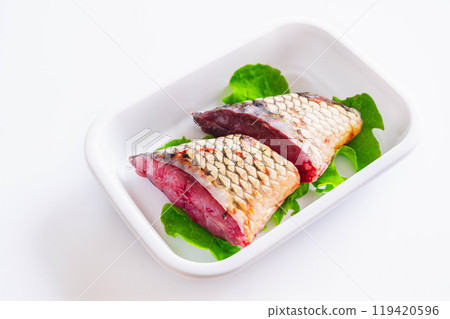 Packaged sliced carp 119420596