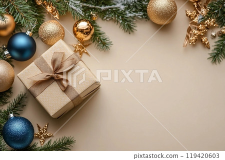 Commemorate New Year in elegance. Top view perspective of carefully wrapped giftbox, chic tree ornaments, glittery balls, seasonal adornments on beige backdrop 119420603