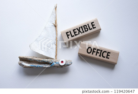 Flexible Office symbol. Concept word Flexible Office on wooden blocks. Beautiful white background with boat. Business and Flexible Office concept. Copy space Flexible Office symbol. Concept word Flexible Office on wooden blocks. Beautiful white background with boat. Business and Flexible Office concept. Copy space 119420647