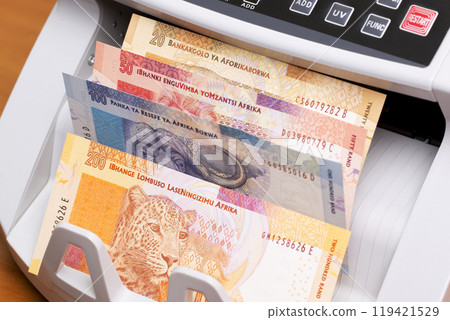 South African money in the counting machine South African money in the counting machine 119421529
