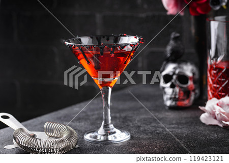 Spooky red Halloween monster cocktail 119423121