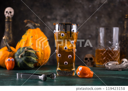 Spooky Halloween cocktail with eyes Spooky Halloween cocktail with eyes 119423158