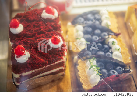 Red velvet cake and blueberry pie cheesecake sale in cafe and restaurant 119423933