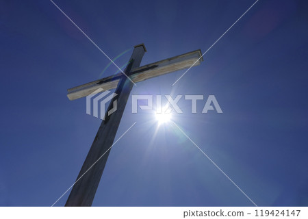 Summit cross of Rechelberg mountain in wintertime, Bavaria, Germany 119424147