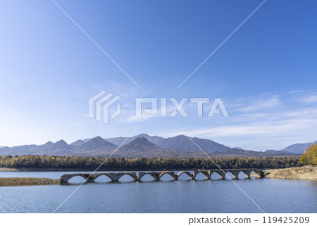 Taushubetsu River Bridge on the former Shihoro Line of the Japanese National Railways on a clear autumn day in Kamishihoro, Hokkaido 119425209